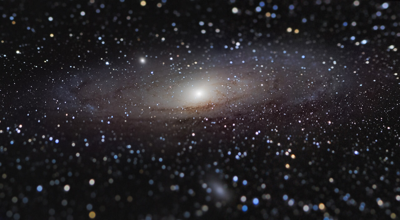 Galáxia de Andômeda pelo ganhador do Insight Investment Astronomy Photographer of the Year, com a imagem Andromeda Galaxy at Arm_s Length © Nicolas Lefaudeux